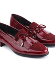 Mocasines para dama con flecos y listones en charol y gamuza