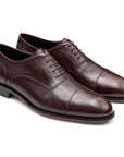 Zapatos oxford de piel con puntera para hombre