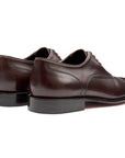 Zapatos oxford de piel con puntera para hombre