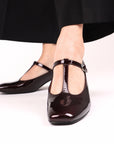 Zapatillas tipo mary jane de charol para dama