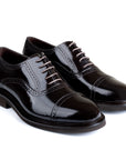 Zapatos oxford de piel con perforaciones en puntera y laterales para caballero