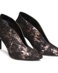 Zapatilla abotinada en ante con detalles plateados para mujer