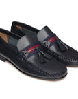 Mocasines tejidos de piel con cinta textil y motas para caballero