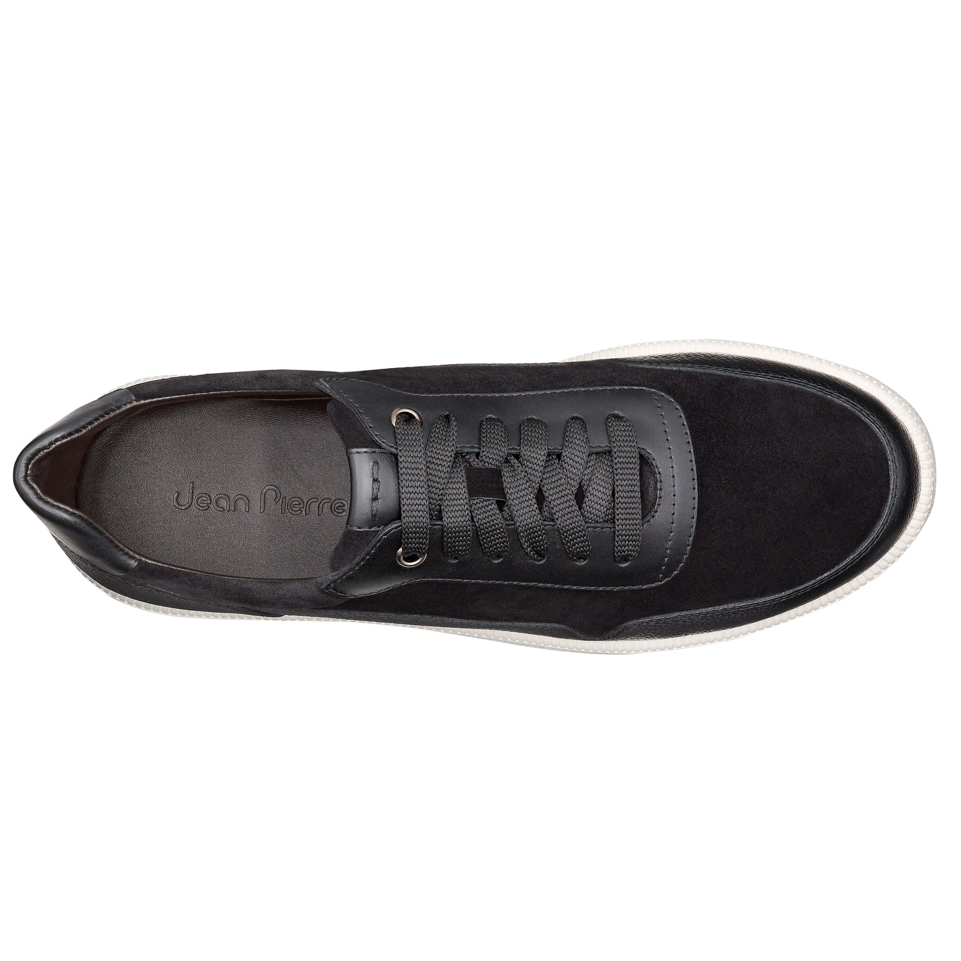 Tenis de piel color negro con diseño minimalista para caballero