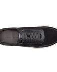 Tenis de piel color negro con diseño minimalista para caballero