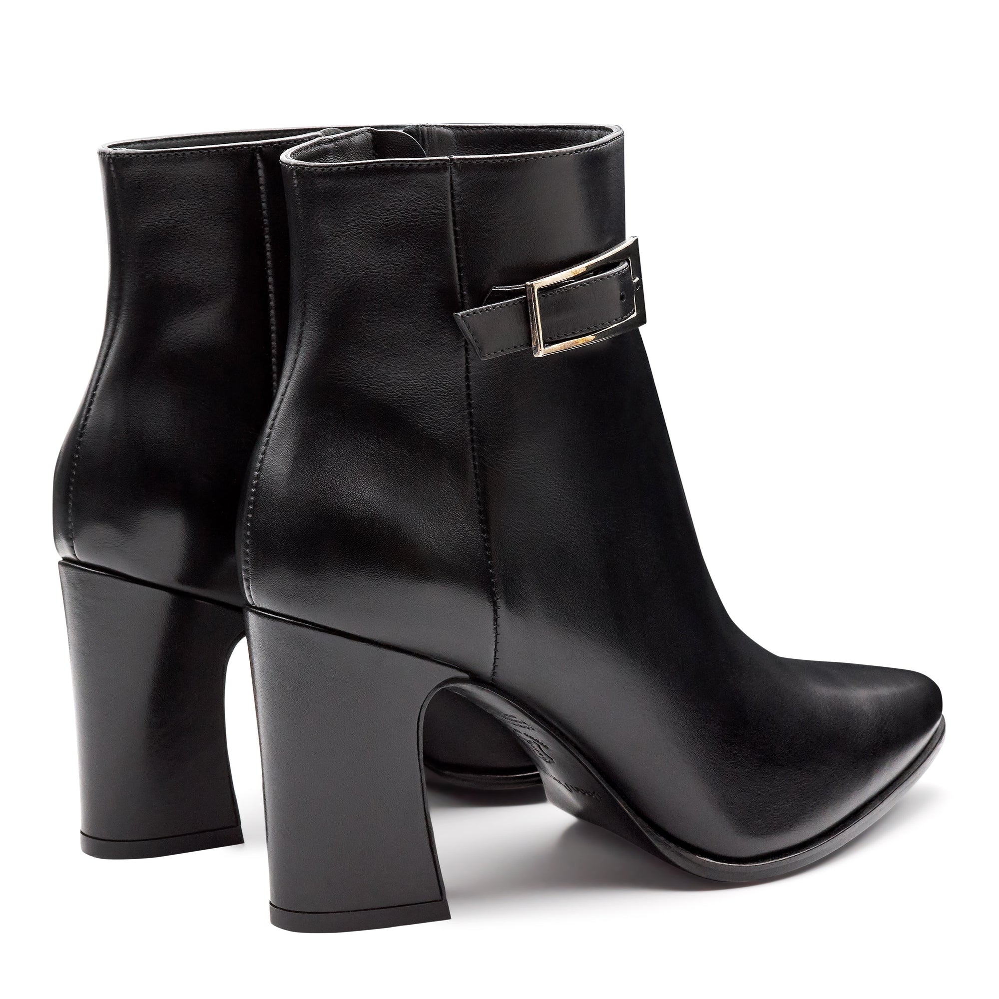 Botines negros de piel con hebilla lateral y tacón alto para dama