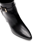 Botines negros de piel con hebilla lateral y tacón alto para dama