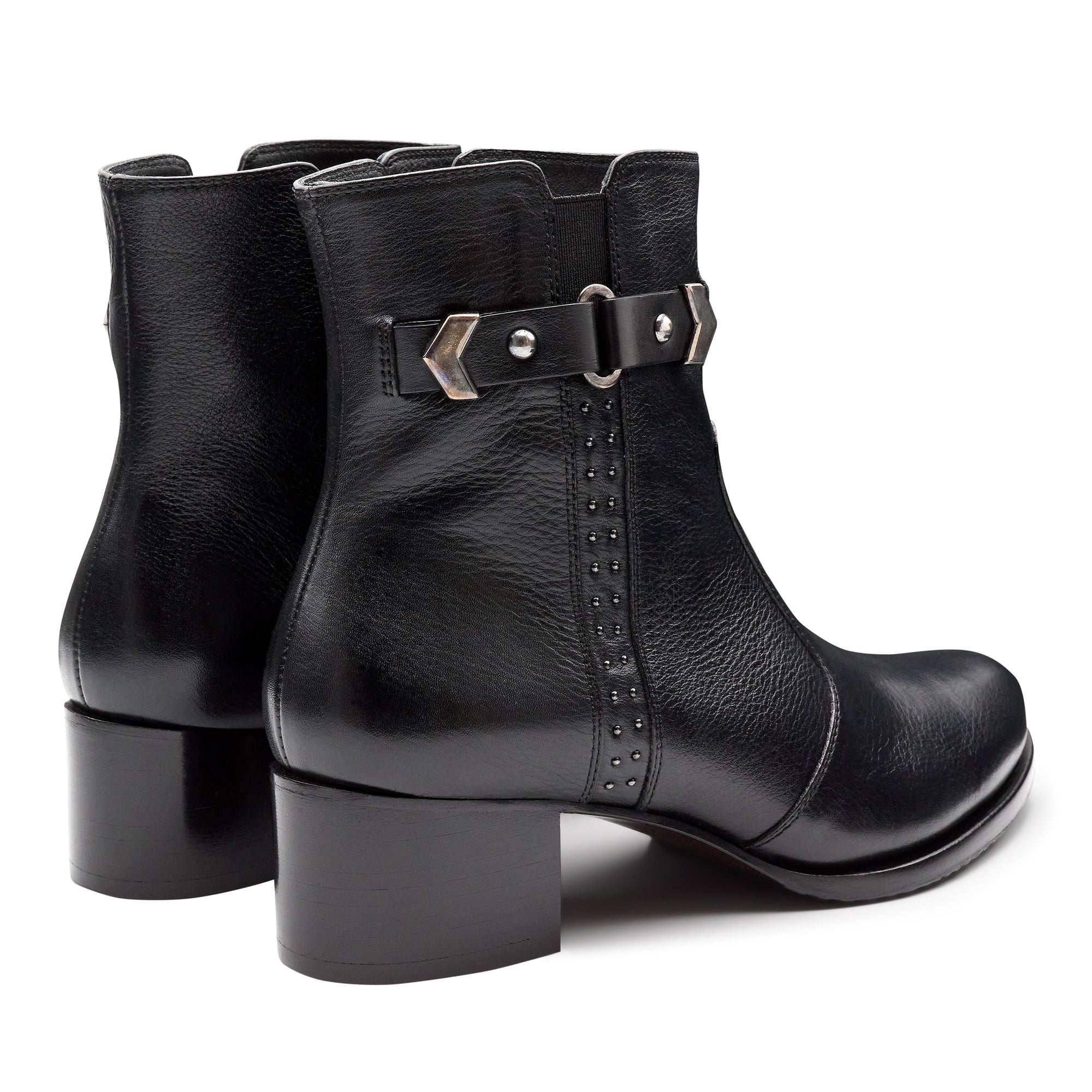 Botines de piel de tacón bajo con aplicaciones metálicas y herraje para mujer