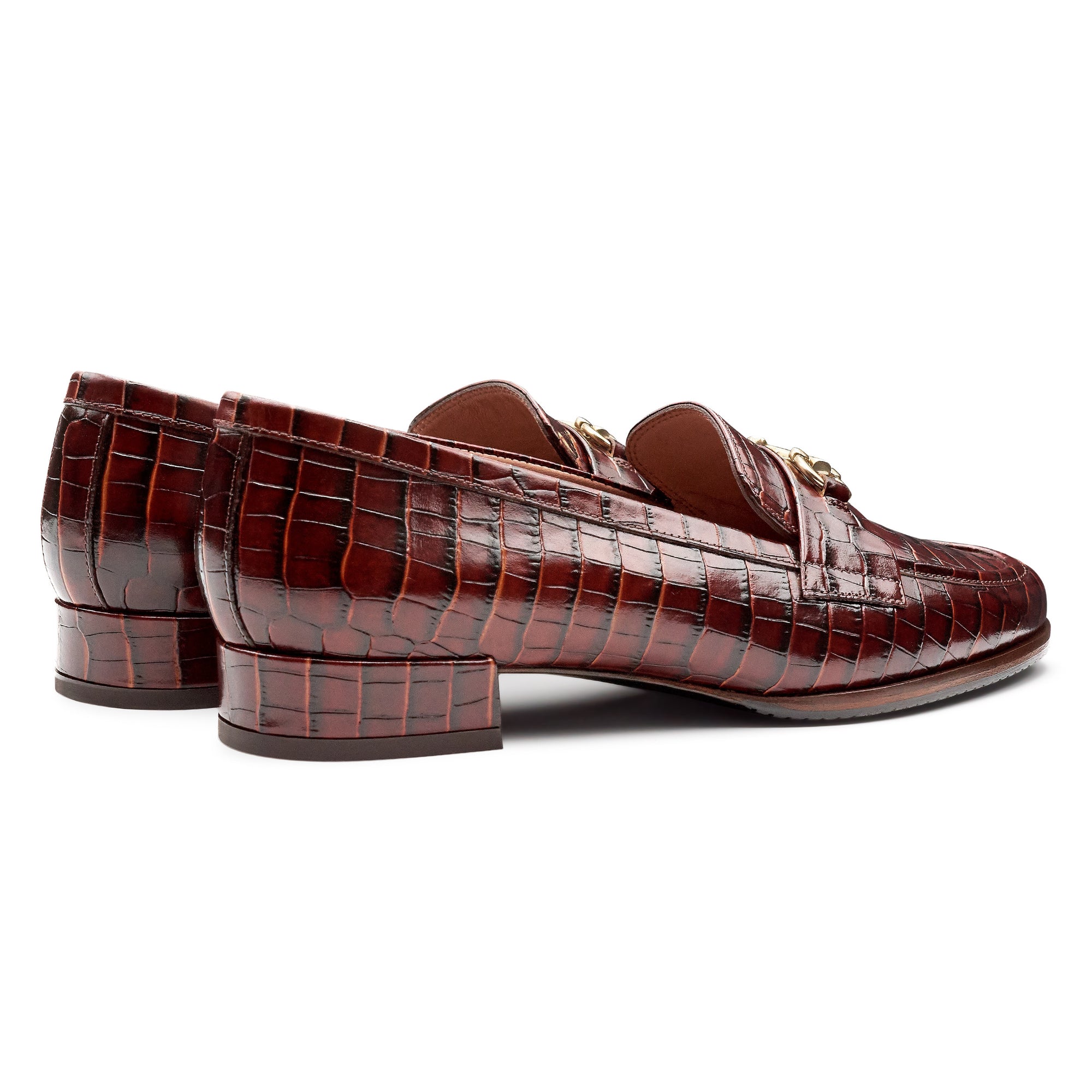 Mocasines de piel con grabado y hebilla metálica para dama