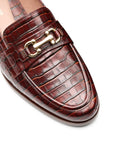 Mocasines de piel con grabado y hebilla metálica para dama
