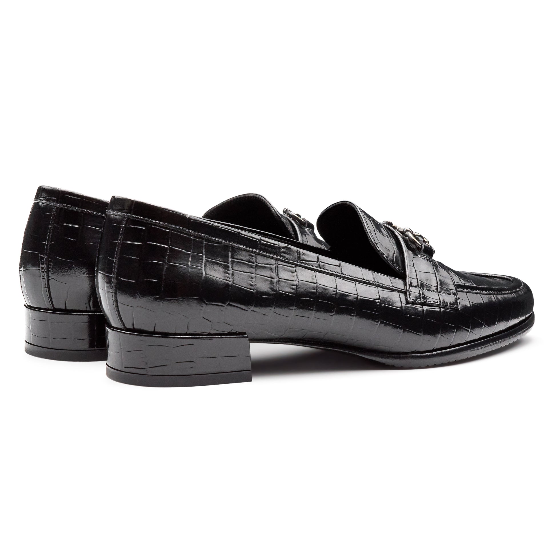 Mocasines de piel con grabado y hebilla metálica para dama