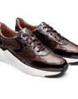 Tenis estilo deportivo en charol para dama
