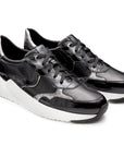 Tenis estilo deportivo en charol para dama negros