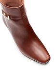 Botines de piel con hebilla lateral para dama