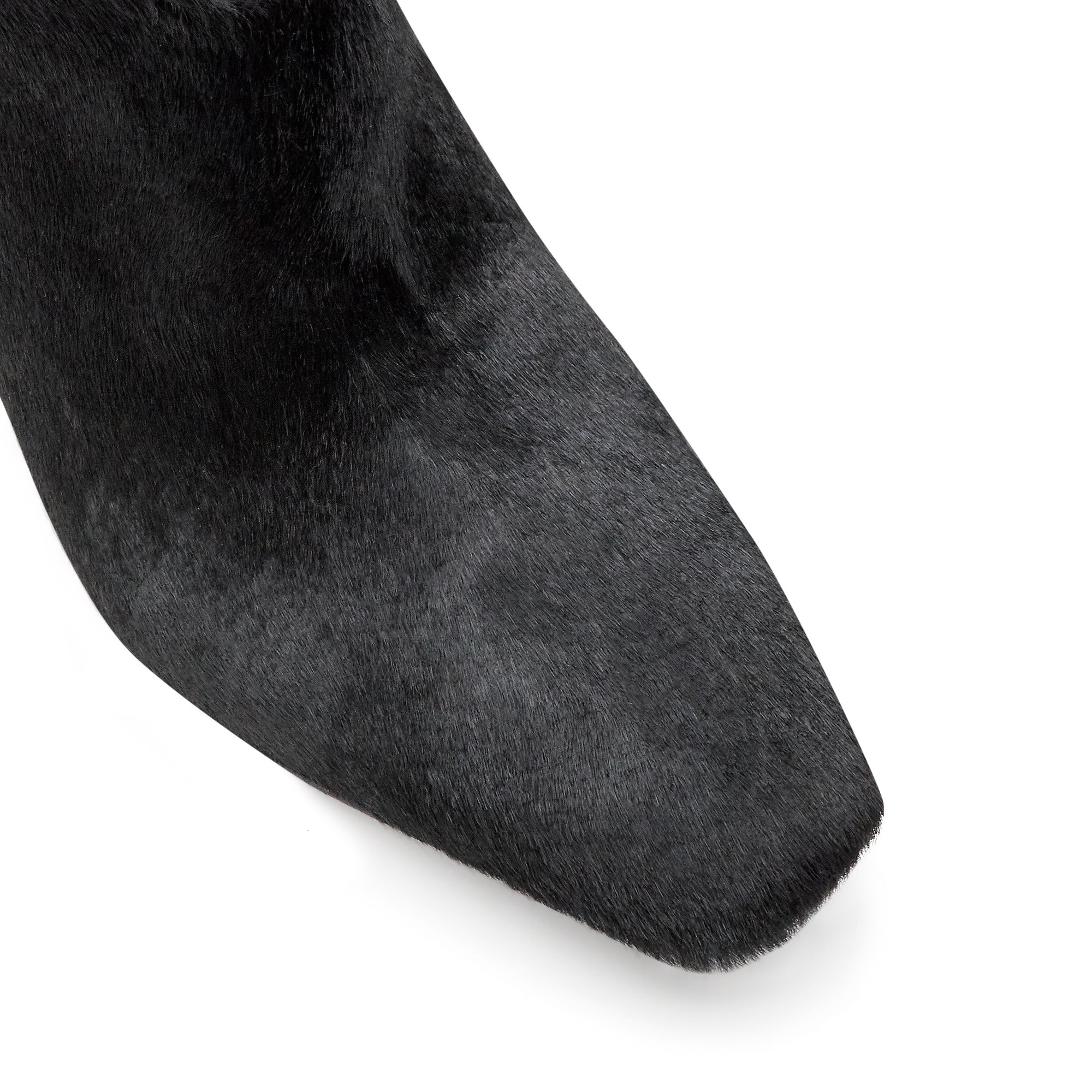 Botines con acabado en pelo natural de becerro para dama