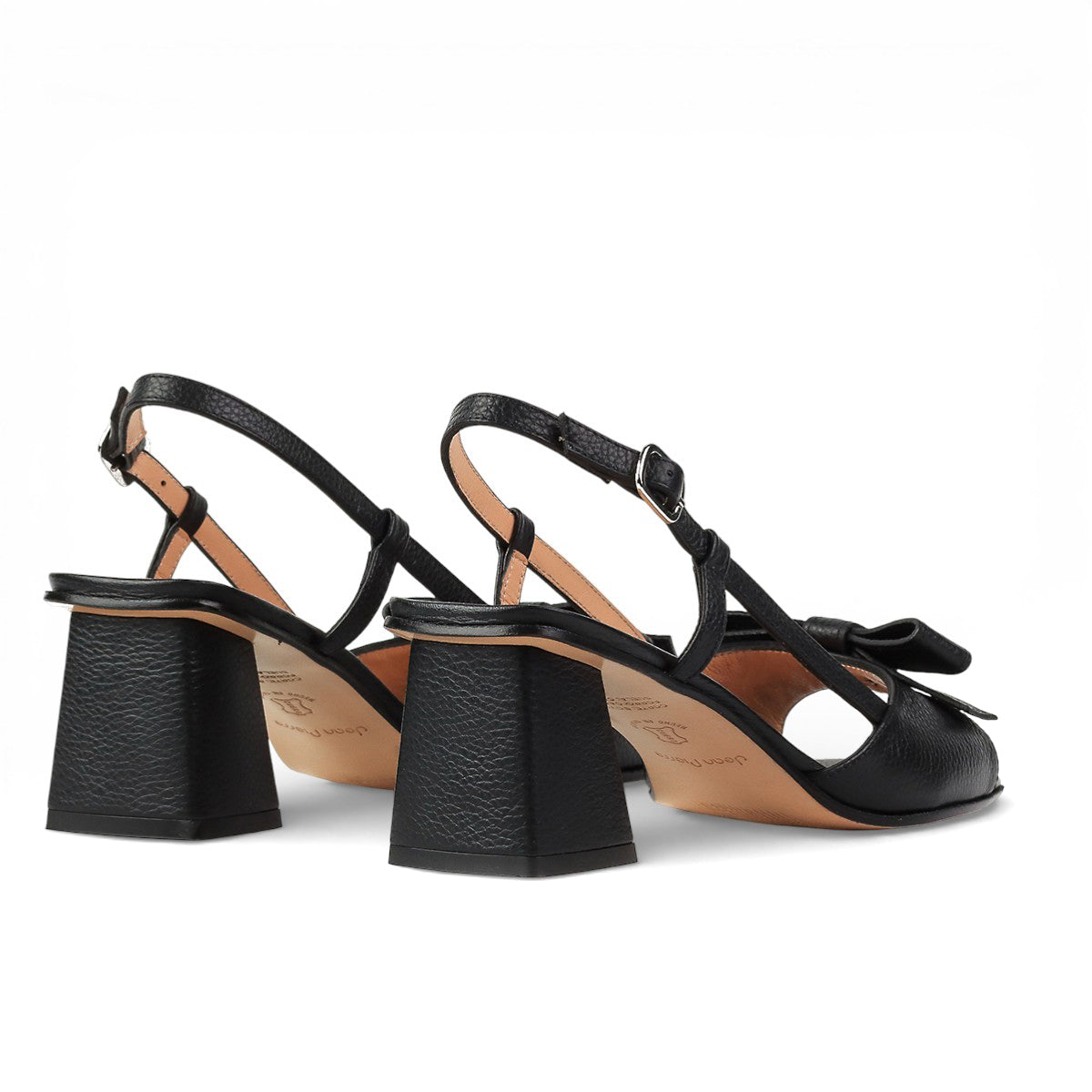 Sandalias de piel negras con moño en empeine y tacón medio para mujer